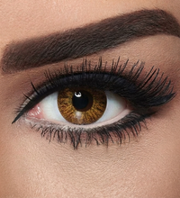 Close-up of a brown eye with makeup. Bella Natural Cool Hazel