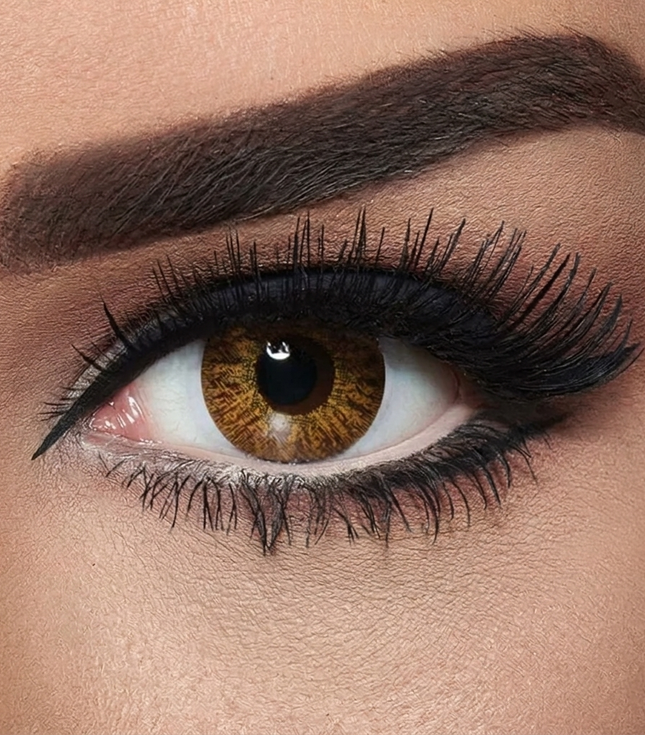 Close-up of a brown eye with makeup. Bella Natural Cool Hazel