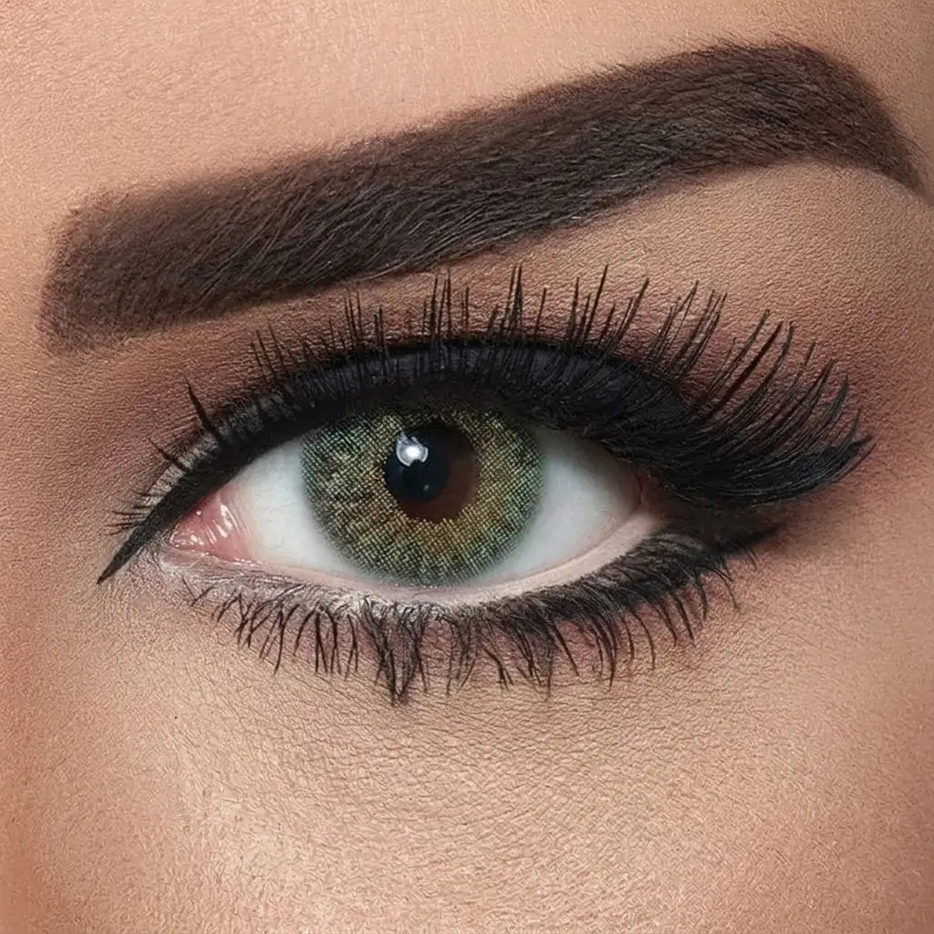 Close-up of a woman's eye with makeup, including eyeliner and mascara.