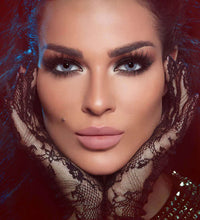 Woman wearing lace gloves with a dark, artistic background. Bella One Day Bluish Grey.