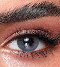 Close-up of a person's eye with detailed makeup. Bella One Day Bluish Grey.