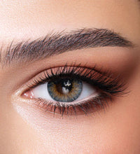 Close-up of a woman's eye with detailed makeup. Bella One Day Ocean Blue